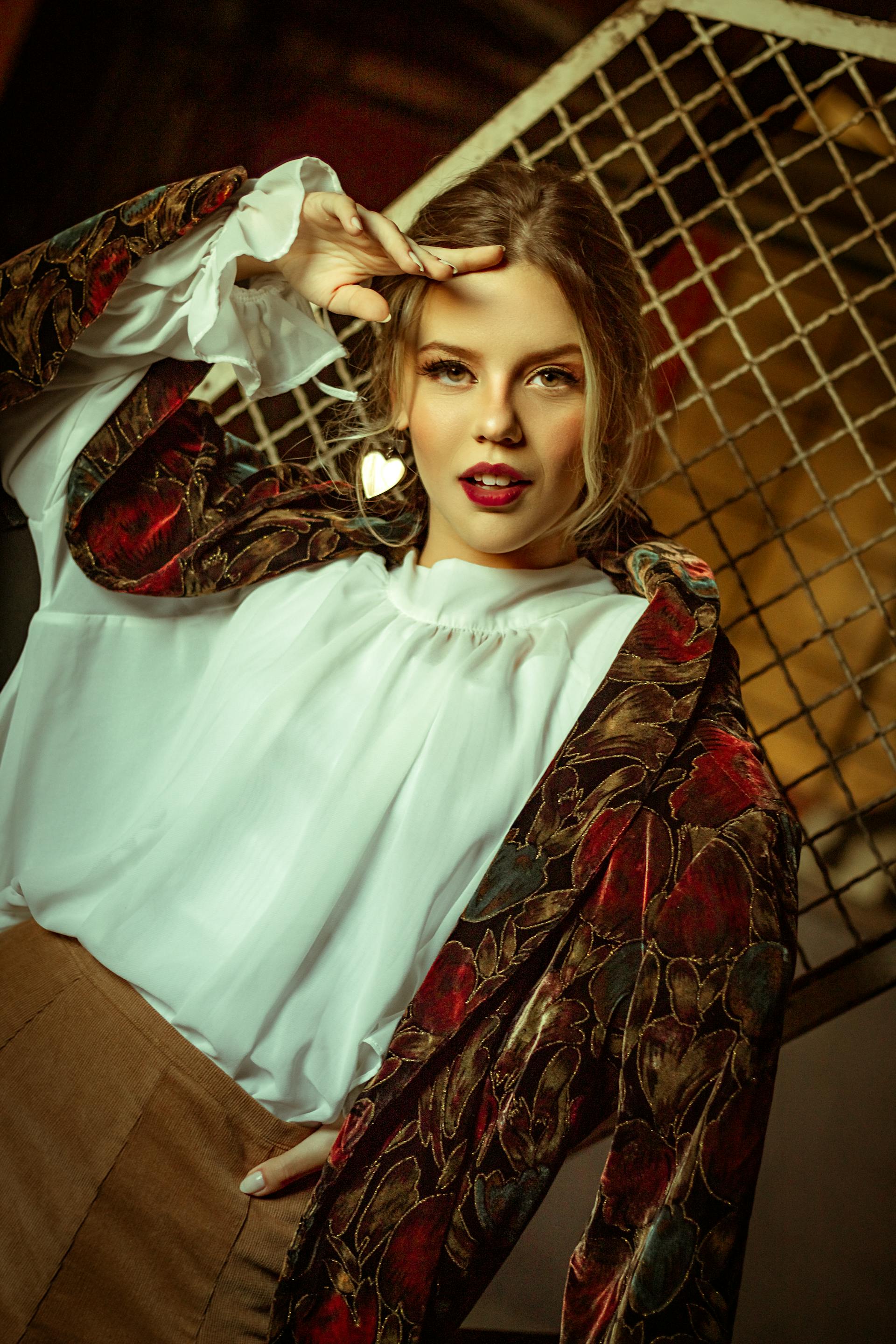 Editorial fashion portrait of a model in vintage-inspired styling